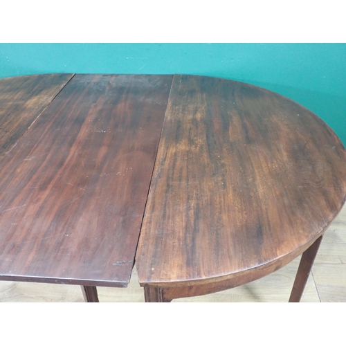 524 - A 19th Century mahogany D-End Dining Table (One spare leaf) on tapered supports, 5ft 10