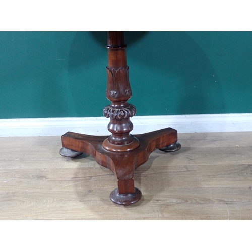 535 - A circular topped mahogany Tripod Table with carved and turned column, 2ft 6