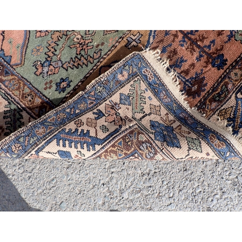 560 - Six various Persian and Persian style Rugs