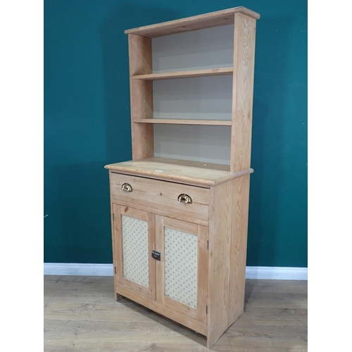 566 - A pine Dresser with fitted drawer above pair of panel doors, 6ft 2