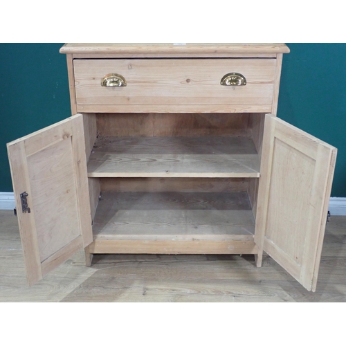 566 - A pine Dresser with fitted drawer above pair of panel doors, 6ft 2