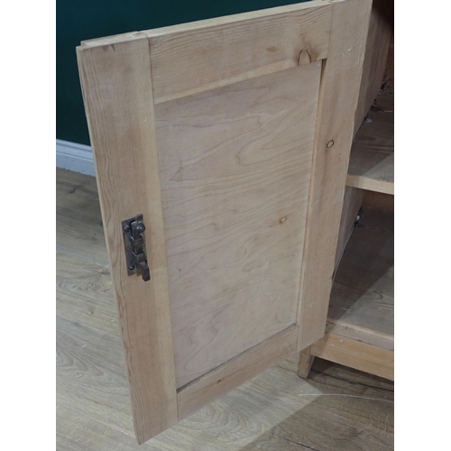 566 - A pine Dresser with fitted drawer above pair of panel doors, 6ft 2