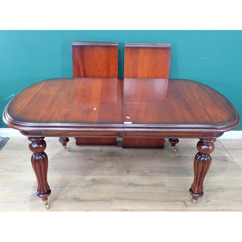 570 - A reproduction extending Dining Table in the Victorian style and eight Chairs, all with baluster ree... 