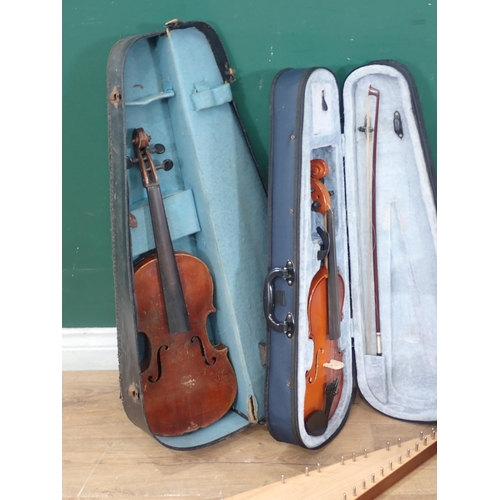 578 - A Pietro Piano Accordian in case, two Violins in cases, Zither and a brass Trombone