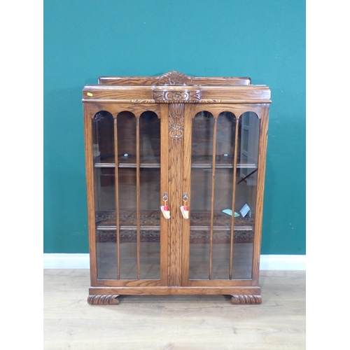 596 - A carved oak glazed Display Cabinet with pair of doors, 3ft 1in H x 3ft 1in W