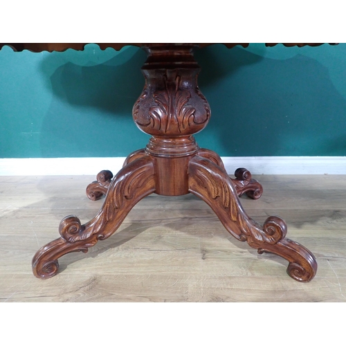 633 - A reproduction mahogany Dining Table on carved and turned column and quadruple platform base, 5ft 8