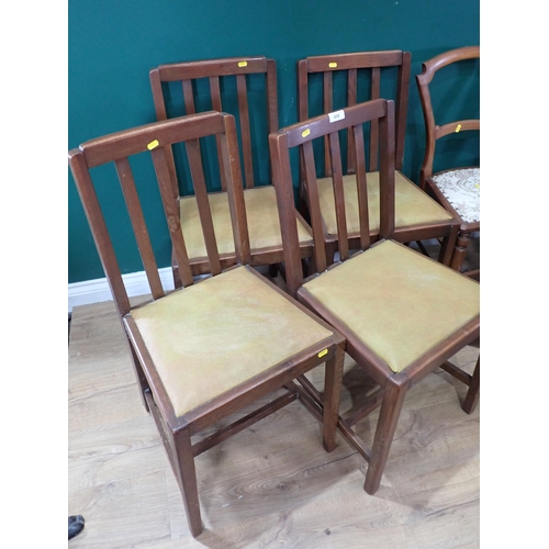 635 - A set of four Dining Chairs with drop in rexine seats, an oak framed Swivel Elbow Chair a Ladderback... 