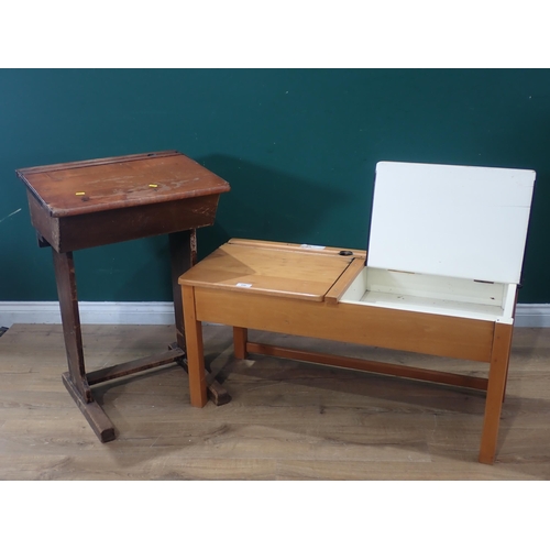 A pair of Vintage School Desks with hinged lids on square cut supports