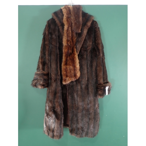 662 - A Vintage ladies Fur Coat and Stoles.