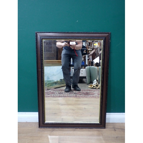 669 - A modern Wall Mirror with bevelled plate.