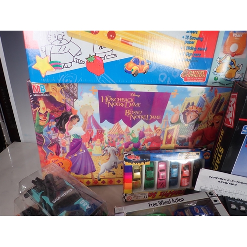 672 - A box of assorted Children's Toys and Board Games, etc.