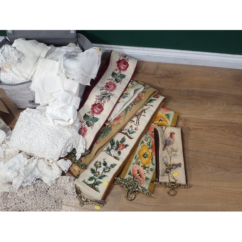 675 - A quantity of Textiles and Materials including, Lace Doilies, Table Cloths etc.