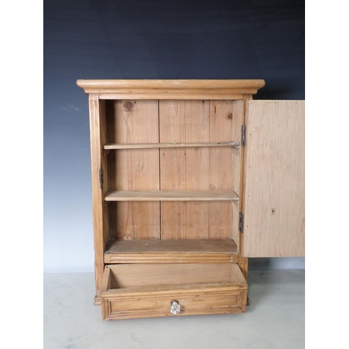 677 - A small pine mirror door Cabinet with single fitted drawer, 1ft 8