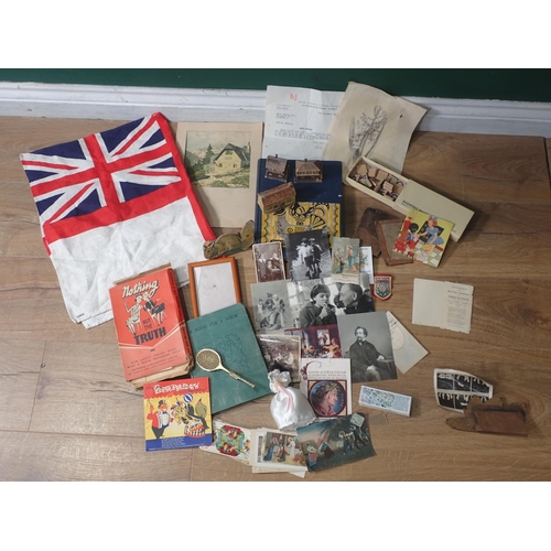 682 - A box of assorted Ephemera, playing cards, Children's Book, a flag, Handkerchief.