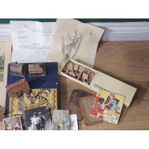 682 - A box of assorted Ephemera, playing cards, Children's Book, a flag, Handkerchief.