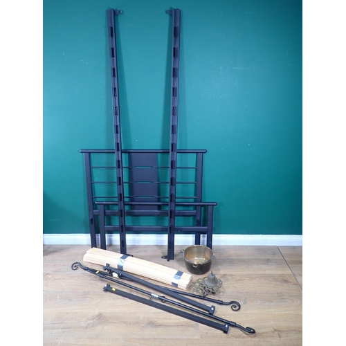 684 - A modern black painted Single Bed. Two metal Curtain Poles, brass Jam Pan, Trivet and a Bell