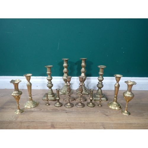 685 - A box of assorted brass Candlesticks.