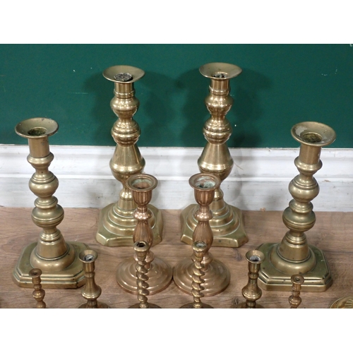 685 - A box of assorted brass Candlesticks.