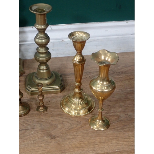 685 - A box of assorted brass Candlesticks.