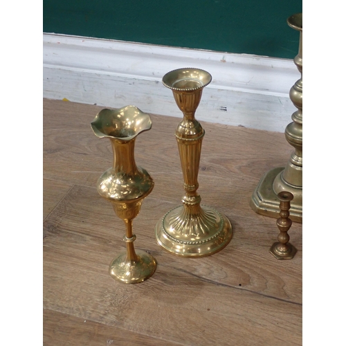 685 - A box of assorted brass Candlesticks.