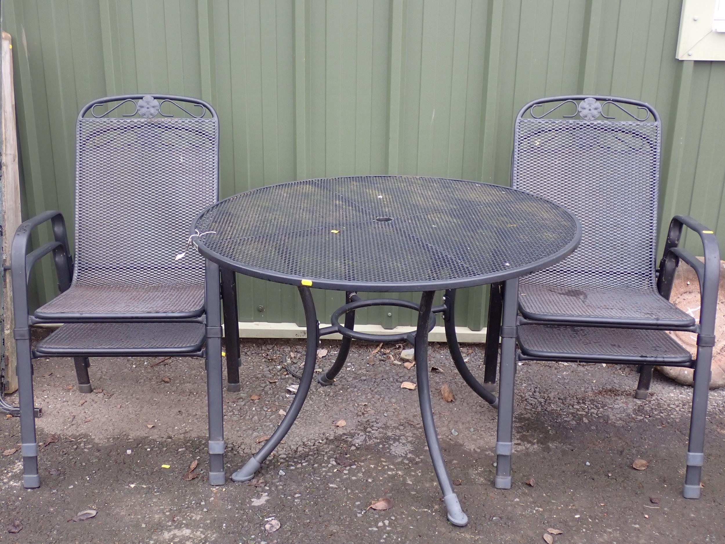 A Kettler metal Garden Table and four Chairs