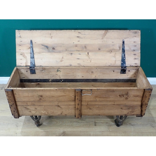 77 - A rustic pine Storage Box on metal supports and castors, 4ft Long x 1ft 11