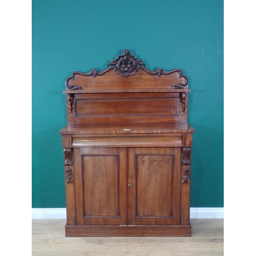 85 - A mahogany Chiffonier with shaped back with single shelf, carved leafage and floral designs, single ... 