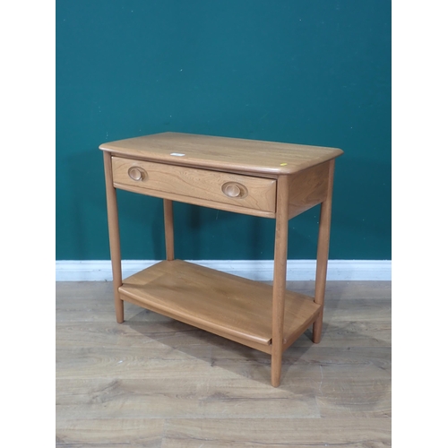 93 - An Ercol two tier Side Table fitted with 
single drawer (Stamped in Drawer) 2ft 8