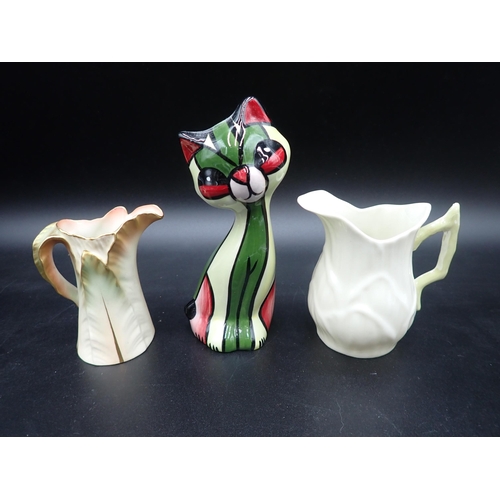 99 - A Lorna Bailey pottery Cat, 5½in, signed, a Royal Worcester leafage moulded Jug, and a Belleek Jug