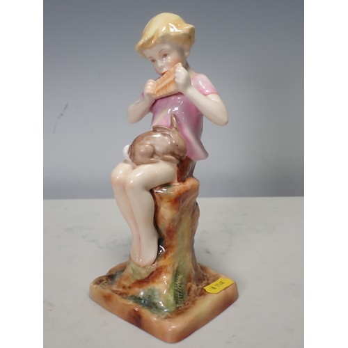 275 - A Royal Worcester Figure of Peter Pan nursing a rabbit, no 3011, modelled by F. Gertmer, 8 1/2in H