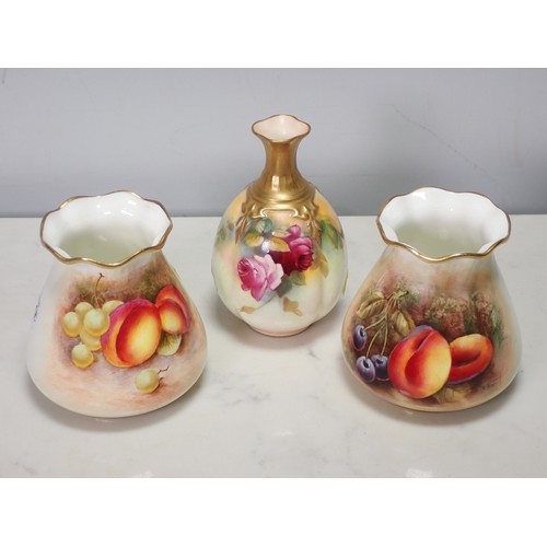 276 - Two small Royal Worcester Vases with gilded flared rims, painted still life of fruit, signed by diff... 