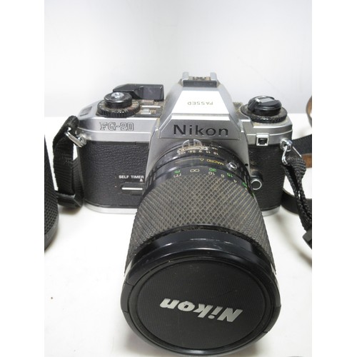 278 - A Nikon FG-20 35mm Camera with Soligor 28-80mm lens, a Nikkor 100-300mm Zoom Lens, a small Rollei Le... 