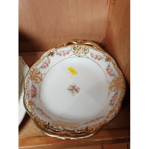 291 - A floral and gilt Dish and a quantity of assorted ceramic Plates.