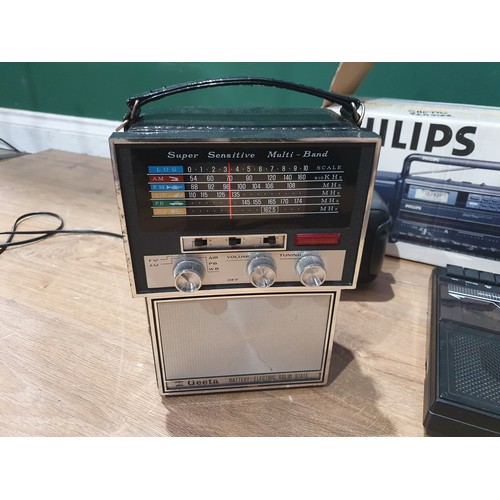 193 - Six Radios including a boxed Philips dual deck Stereo radio cassetter recorder and a Roberts Rambler... 