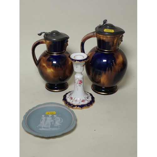 226 - Two Wedgwood Jugs 'Doric' with blue and brown marbled type glaze and hinged pewter covers, 8in and 7... 