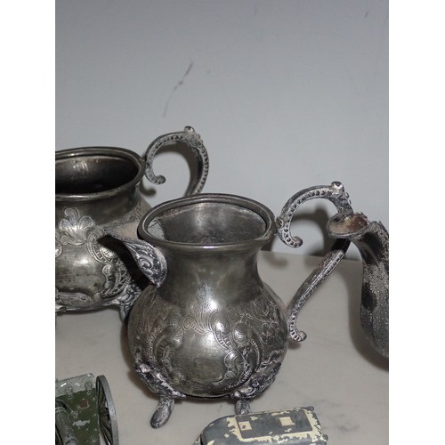 208 - A box of play worn diecast Models and pewter Tea Service