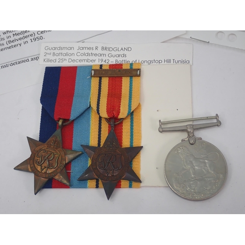 1232 - Three: 1939-45 Star; Africa Star (1st Army) and War Medal (lacking ribbons) to 2655488 Guardsman Jam... 