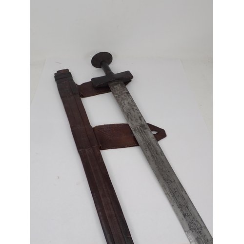 1260 - A Sudanese Sword, Kaskara in tooled leather scabbard