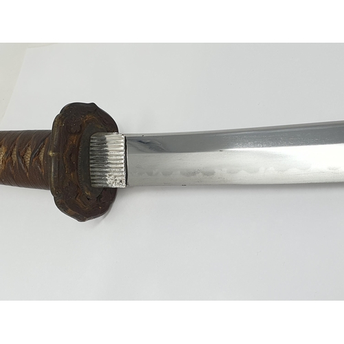 1277 - A Japanese Sword, Katana, by Musashi Taro Yasukuni. This sword came from a local estate and is most ... 