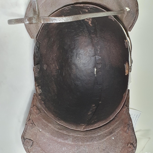 1279 - An English Civil War Cromwellian 'Lobster Tail' Pot Helmet and Breastplate. The helmet has a triple ... 