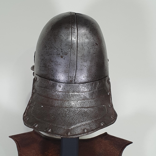 1279 - An English Civil War Cromwellian 'Lobster Tail' Pot Helmet and Breastplate. The helmet has a triple ... 