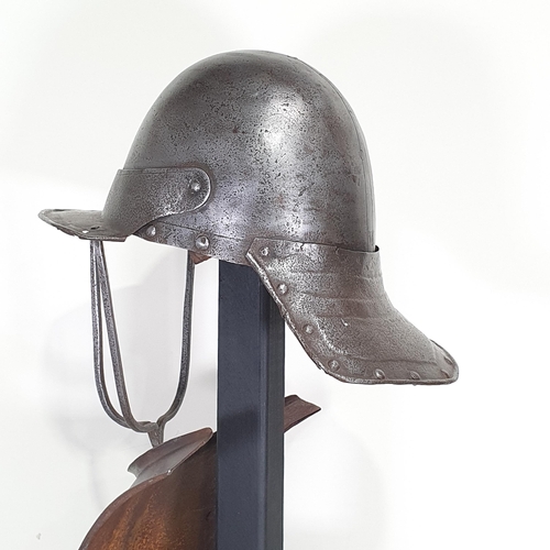 1279 - An English Civil War Cromwellian 'Lobster Tail' Pot Helmet and Breastplate. The helmet has a triple ... 