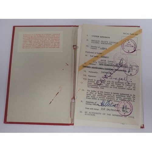 1293 - A collection of items related to Ariel Leon Segal including private Pilot's License, Log Books perta... 