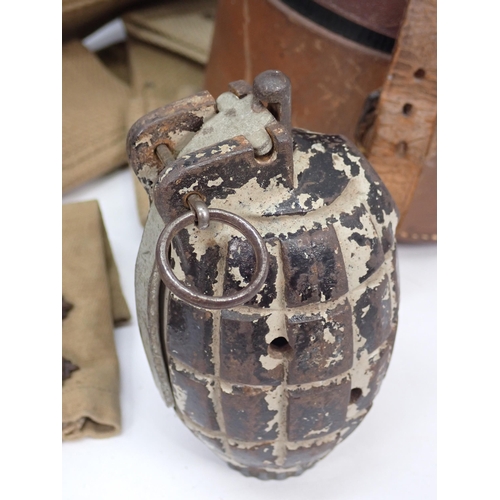 1294 - A box of military items including deactivated Hand Grenade, Officer's Stove in leather case, Sam Bro... 