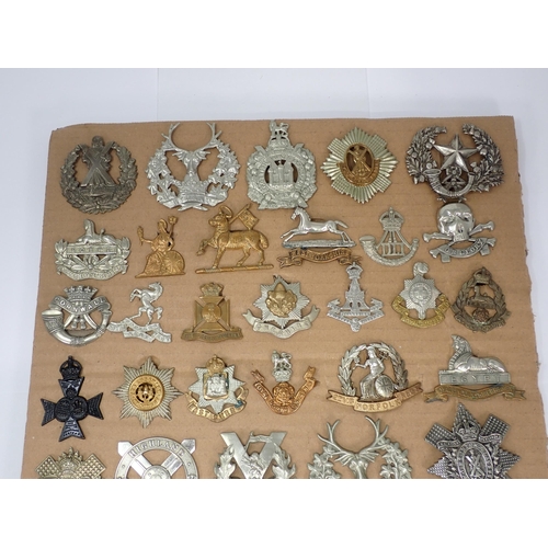 1297 - Three cards of Army Cap Badges including Highland Regiment, Gloucestershire Regiment, Cheshire Regim... 