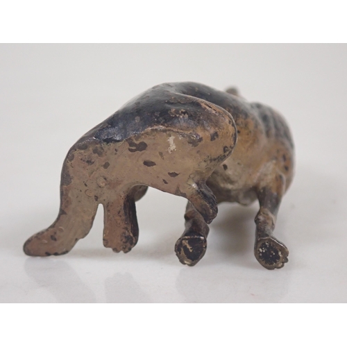 1354 - A cold painted bronze seated German Shepherd, 2 1/2