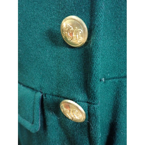 1377 - A Heythrop Hunt Gentleman's green Coat with brass H.H. buttons and tattersall lining