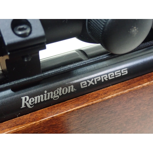 1409 - A Remington Express .22 Air Rifle with 4x32 Telescopic Sight and Bisley Case