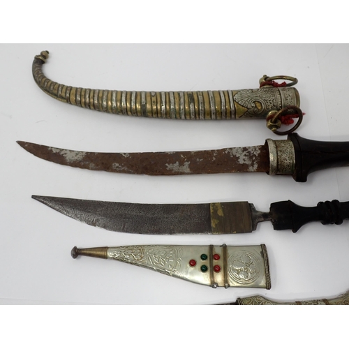 1426 - Four Eastern Daggers and a European Dagger with 'claw and ball' pommel