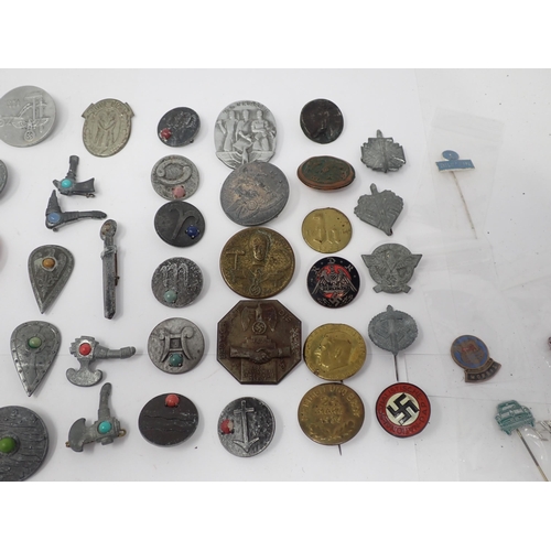 1439 - An extensive collection of Winterhilfswerk tin Badges, Party Badges, etc